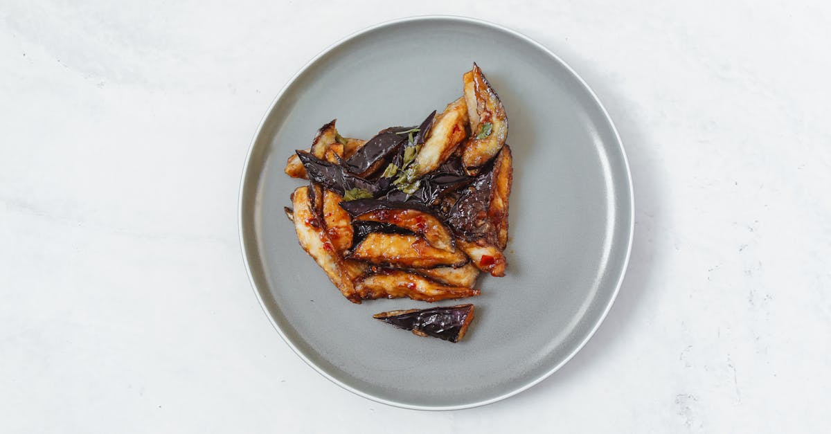 découvrez une recette délicieuse et facile d'aubergines farcies cuites à la friteuse à air pour un repas sain et savoureux.