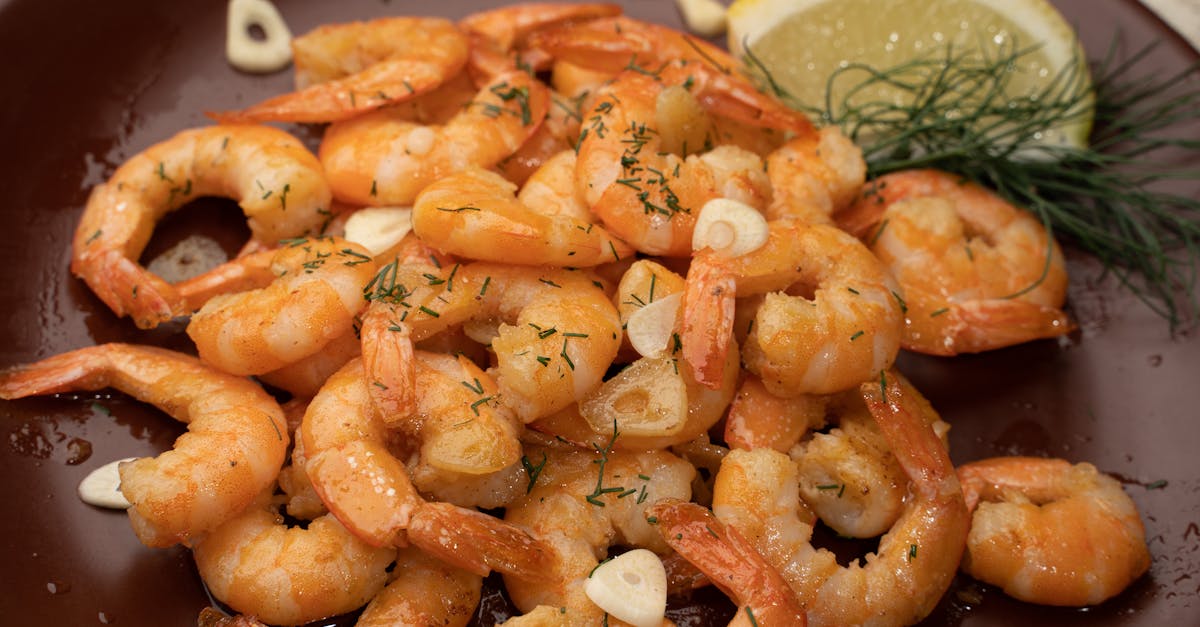 découvrez une recette savoureuse de crevettes à l'ail, facile à préparer et parfaite pour un repas rapide et délicieux.