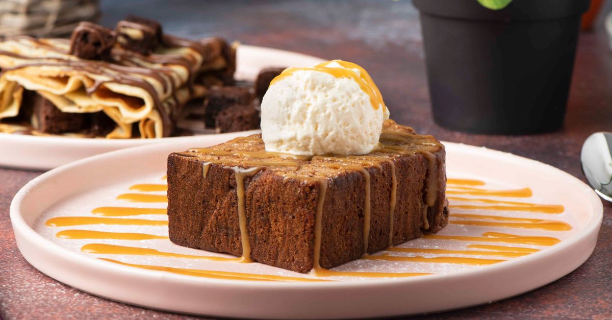 découvrez notre glace au spéculoos, une délicieuse douceur onctueuse aux saveurs épicées des biscuits traditionnels, idéale pour les amateurs de desserts gourmands.